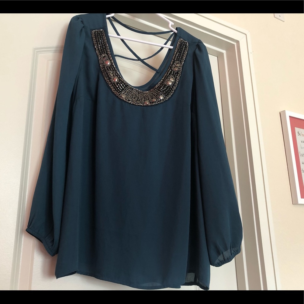 Dark teal sheer like top with decor